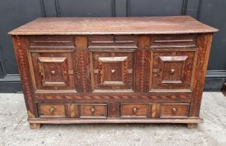 A late 17th century panelled oak and parquetry mule chest, 129.5cm wide.