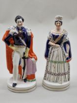 A pair of Victorian Staffordshire pottery figures of 'Queen Victoria' and 'Prince Albert', 28cm