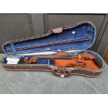 An antique Continental violin, with 14in one piece back, with bow and case.