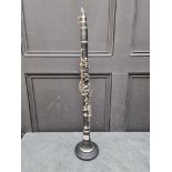 A clarinet, on stand.