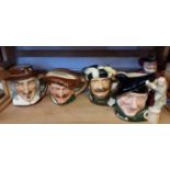 Five Royal Doulton character jugs.