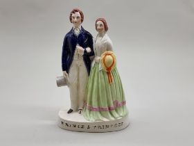 A Victorian Staffordshire pottery figure group of 'Prince & Princess', 26cm high.