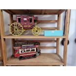 An old scratch built painted wood model stage coach, the wheel base 24.5cm; together with a