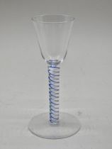 A 19th century colour twist wine glass, 15cm high.