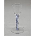 A 19th century colour twist wine glass, 15cm high.