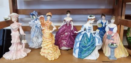 Five Royal Doulton figures; together with two similar Coalport figures. (7)