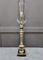 A French Empire style ebonized and brass table lamp, height excluding fitting 75cm.