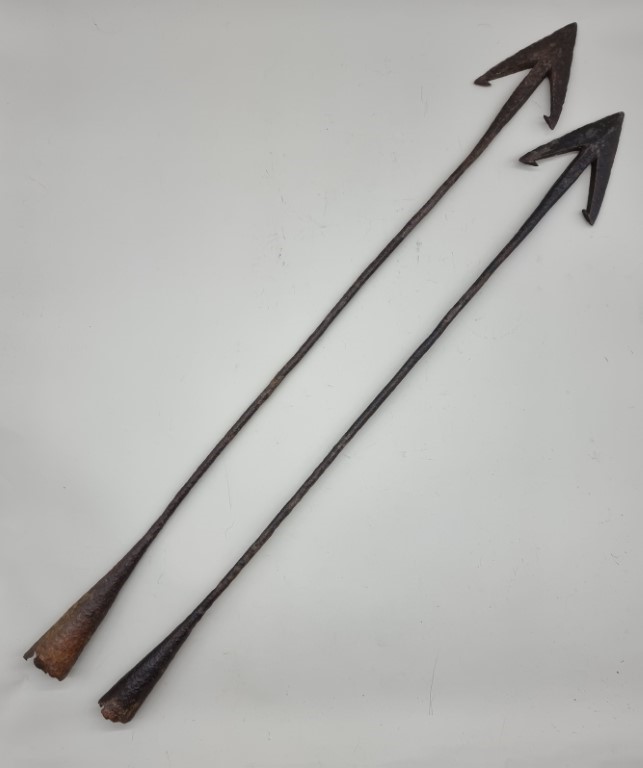 Two 19th century steel whaling harpoons, largest 97cm long.