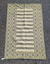 A Swedish double sided rug, 203 x 132cm.