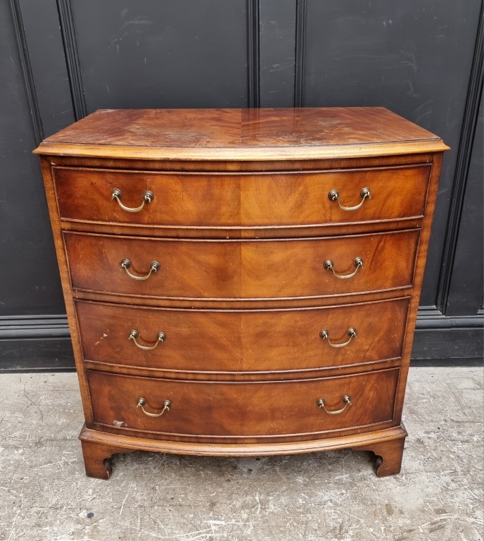 A reproduction mahogany bowfront chest of drawers, 79cm wide.