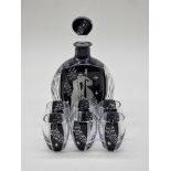 An Art Deco style glass liqueur set, the decanter & stopper 24cm high.
