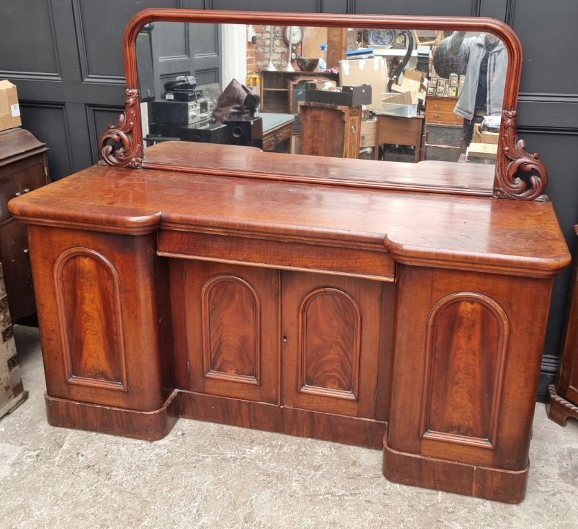 A large Victorian mahogany inverted breakfront mirror back sideboard, 196cm wide.