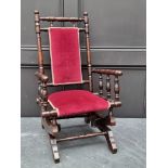 An antique beech child's rocking chair.