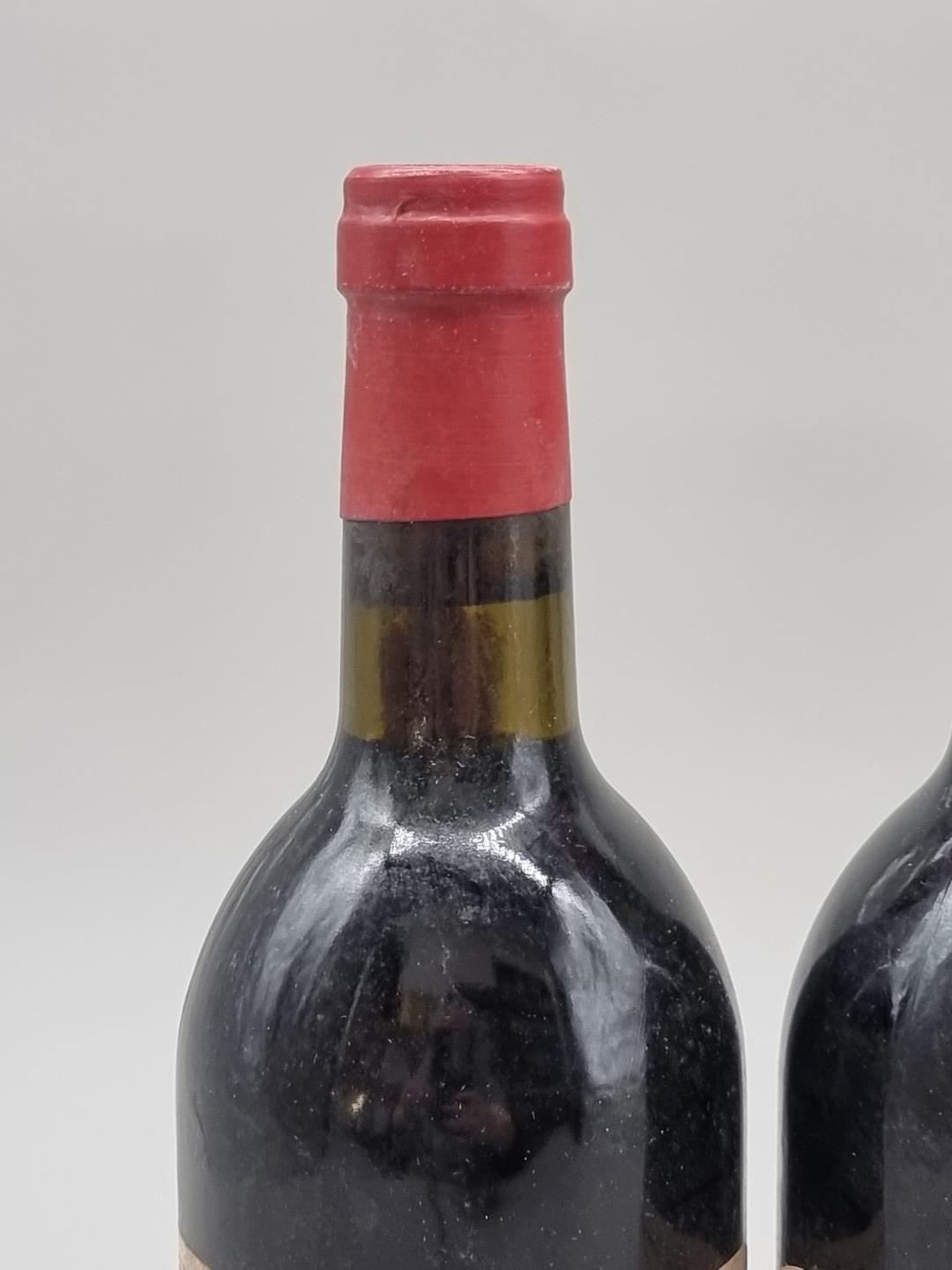 Two 75cl bottles of Chateau Haut-Bailly, 1983, Grand Cru Classe. (2) - Bild 4 aus 5