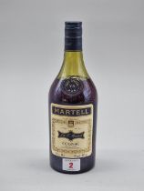 A 24 fl.oz. bottle of Martell VS Three Star Cognac, probably 1970s bottling.