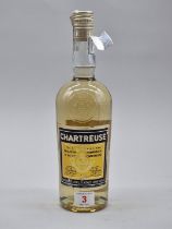 A 75cl bottle of Chartreuse yellow, probably early 1980s bottling, silver capsule.