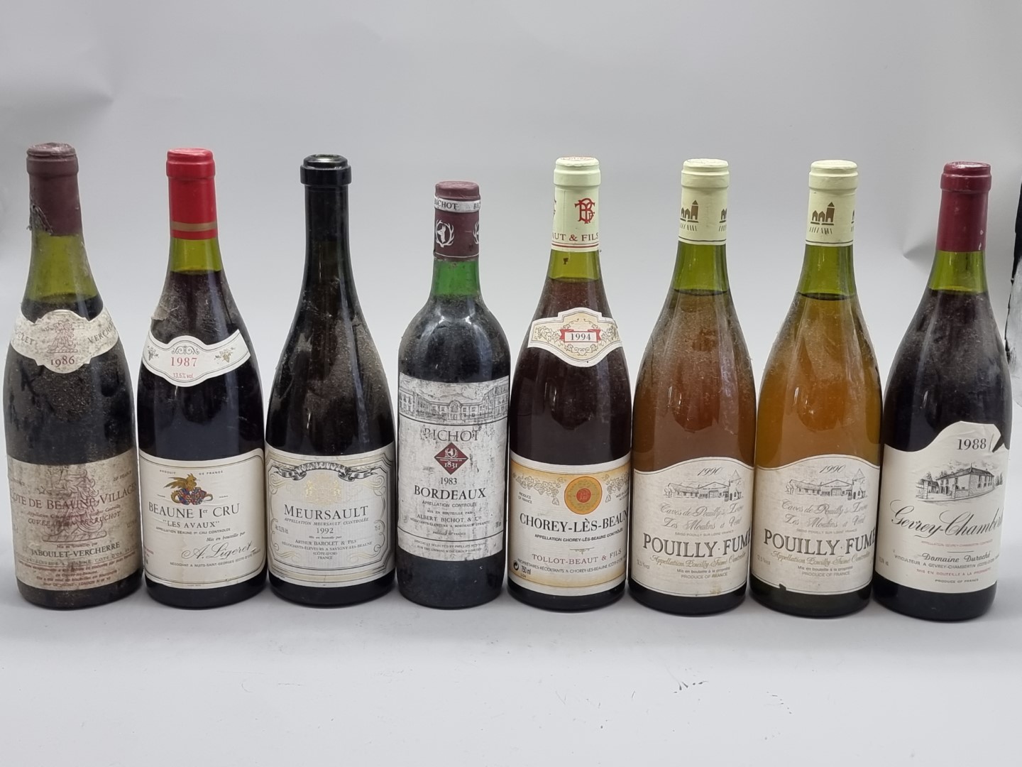 A group of wine, to include: Gevrey-Chambertin 1988; Beaune 1er Cru, 1987; Meursault 1992; and