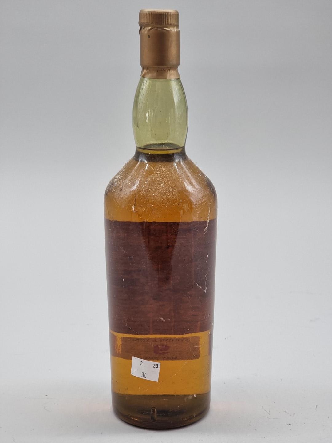 A 1 litre bottle of Talisker 10 Year Old Whisky, old style map label, 45.8% abv, (damage to - Image 6 of 8