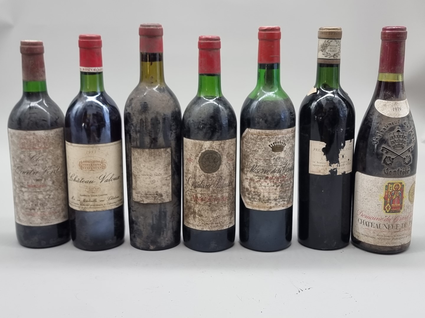An interesting group of French vintage red Wines, comprising: Chateau Palmier, Saint Estephe,