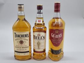 Three bottles of blended Whisky, comprising: a 1 litre Grant's; a 1 litre Teacher's; and a 70cl
