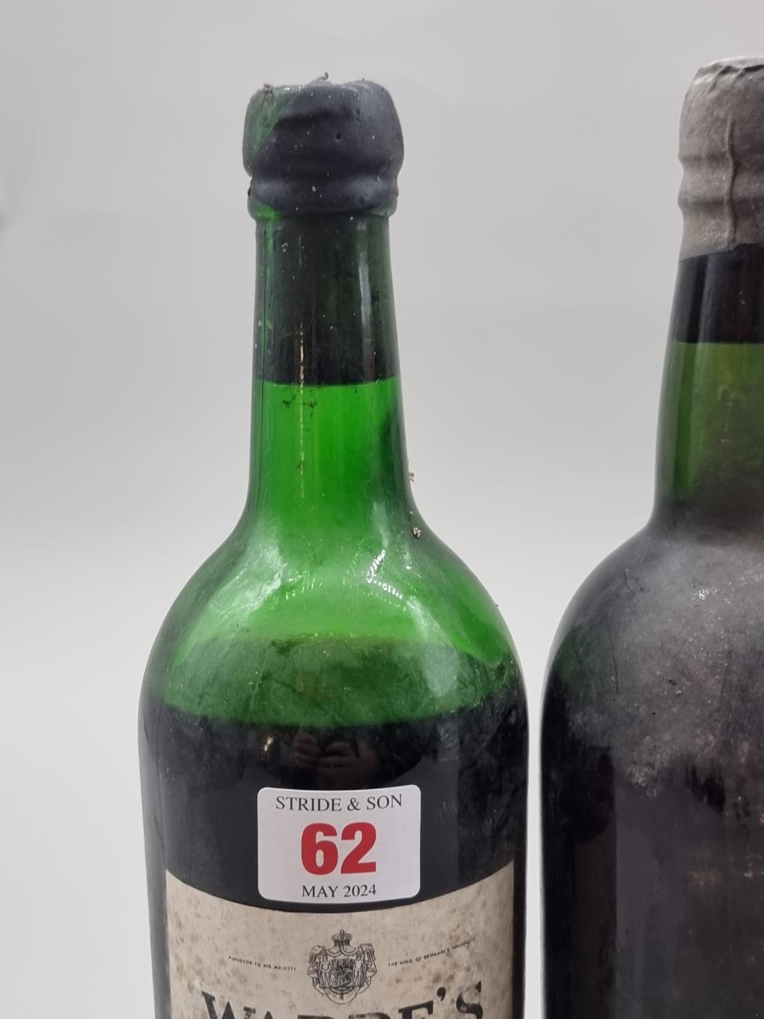 A bottle of Warre's 1970 Vintage Port, (low shoulder level); together with another old bottle of - Image 2 of 3