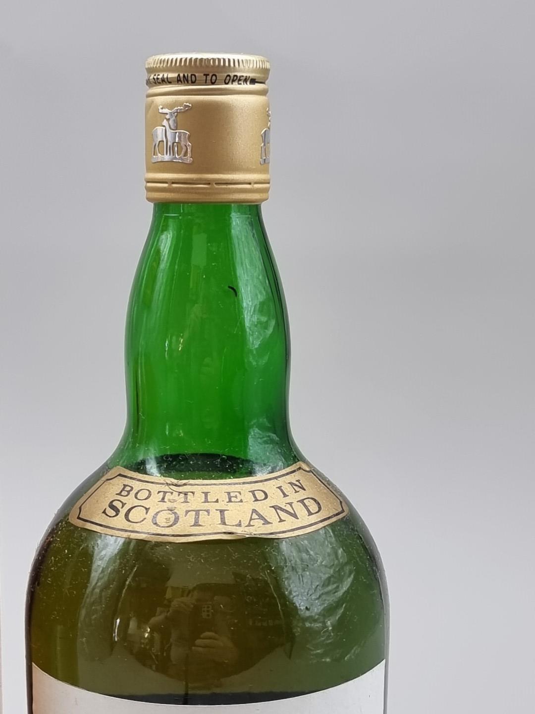 Two old 1 litre bottles of blended Whisky, probably 1970s bottlings, comprising: The Real - Image 3 of 7