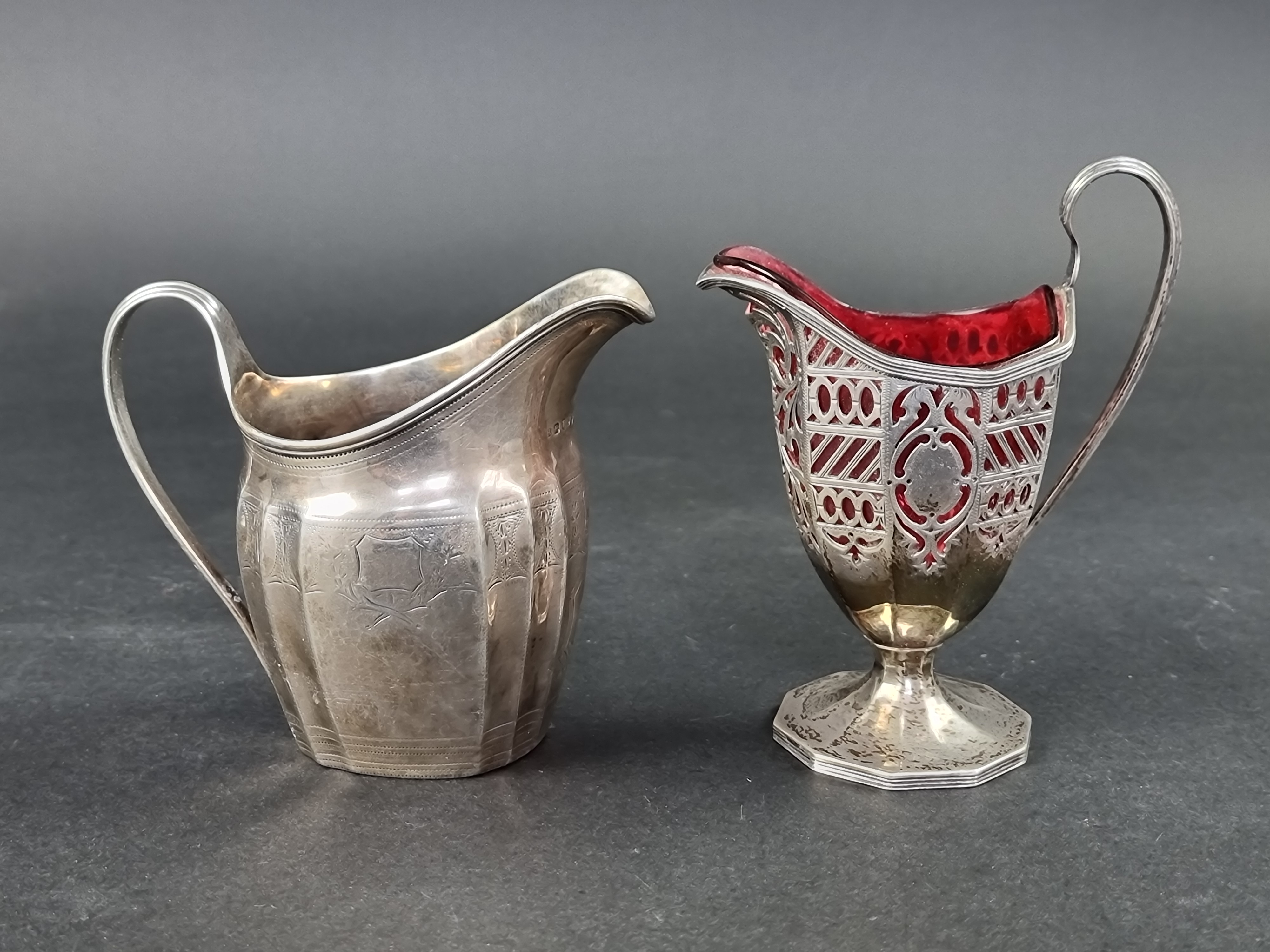 A George III silver jug, maker's mark rubbed, London 1794, height to handle 11cm; together with