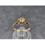 A 9ct gold diamond ring, stamped '9ct', size L 1/2.