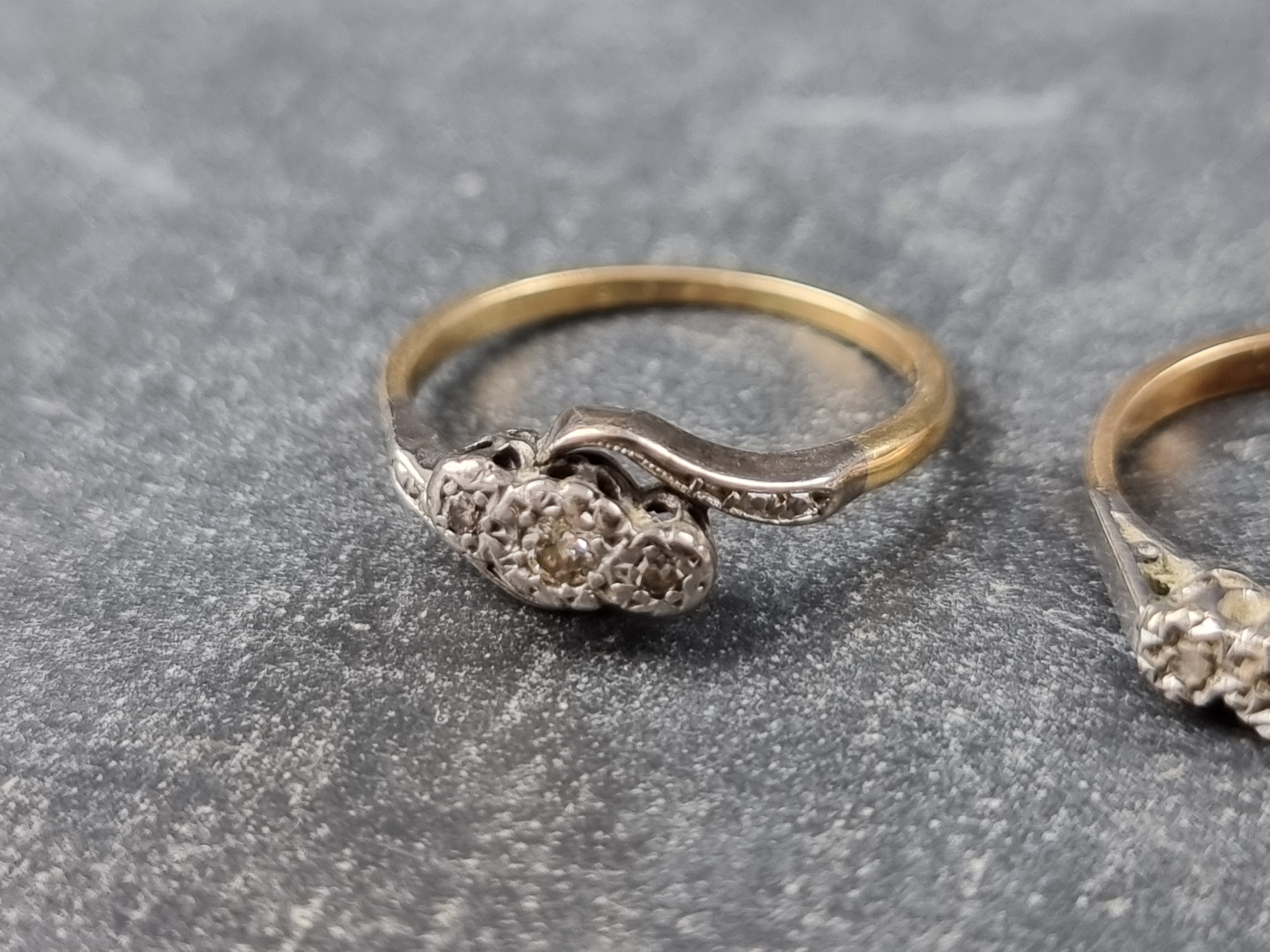 A yellow metal diamond three stone ring, stamped '9ct & plat', size K 1/2; together with a yellow - Image 3 of 3