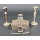 A pair of silver mounted candlesticks, by S J Rose & Son, Birmingham 1972, 19cm high, weighted;