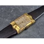 A 1950s Art Deco style Bulova gold plated manual wind wristwatch, 22 x 37mm, on vintage black