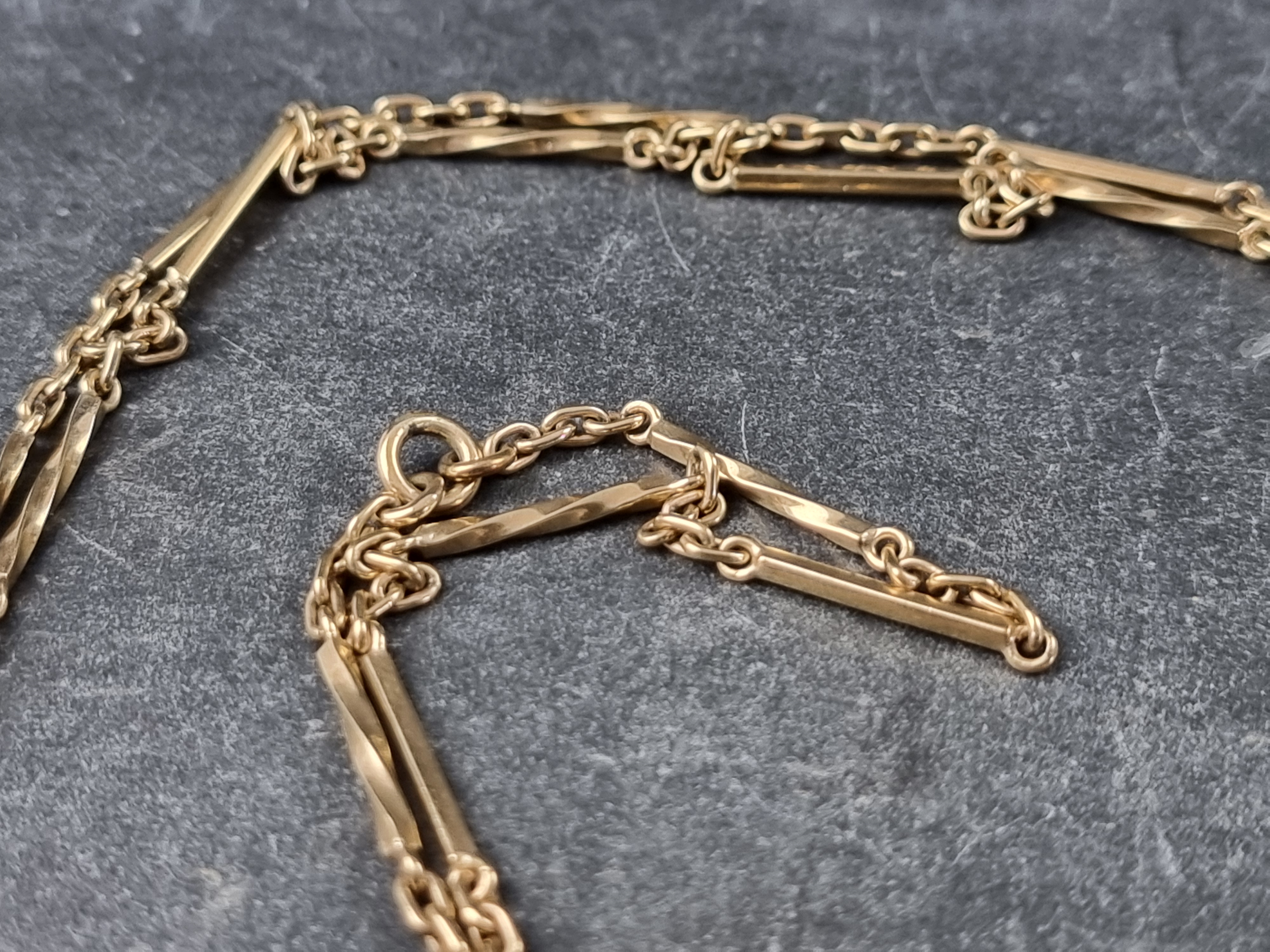 A 9ct gold chain, 90cm, 18.3g. - Image 2 of 2