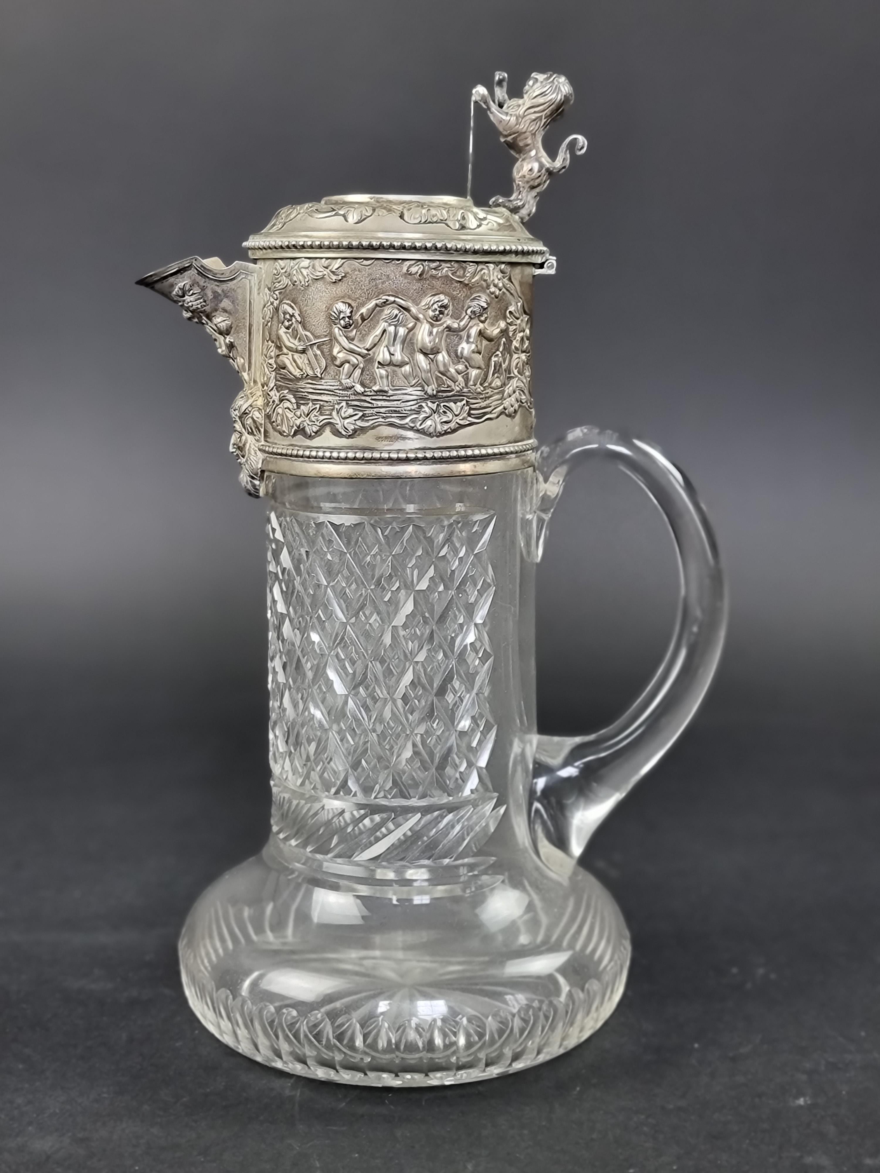 A Portuguese white metal mounted claret jug, by Topazio, 28.5cm high.