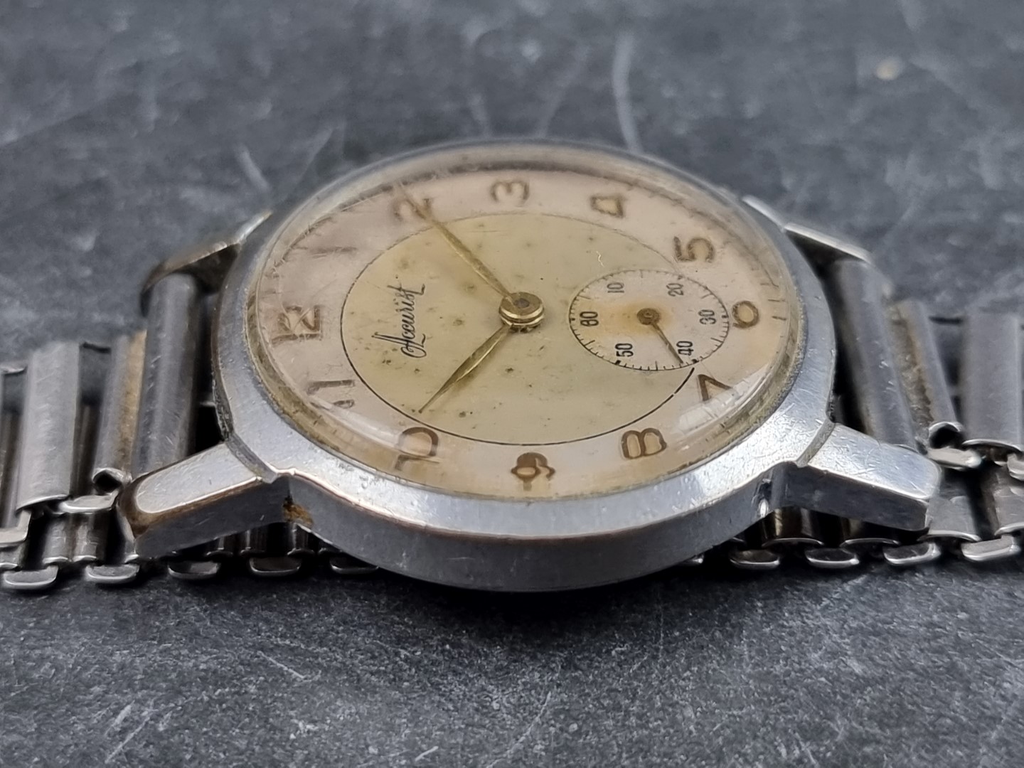 A circa 1950s Accurist stainless steel manual wind wristwatch, 32mm, on stainless steel bracelet. - Image 3 of 4