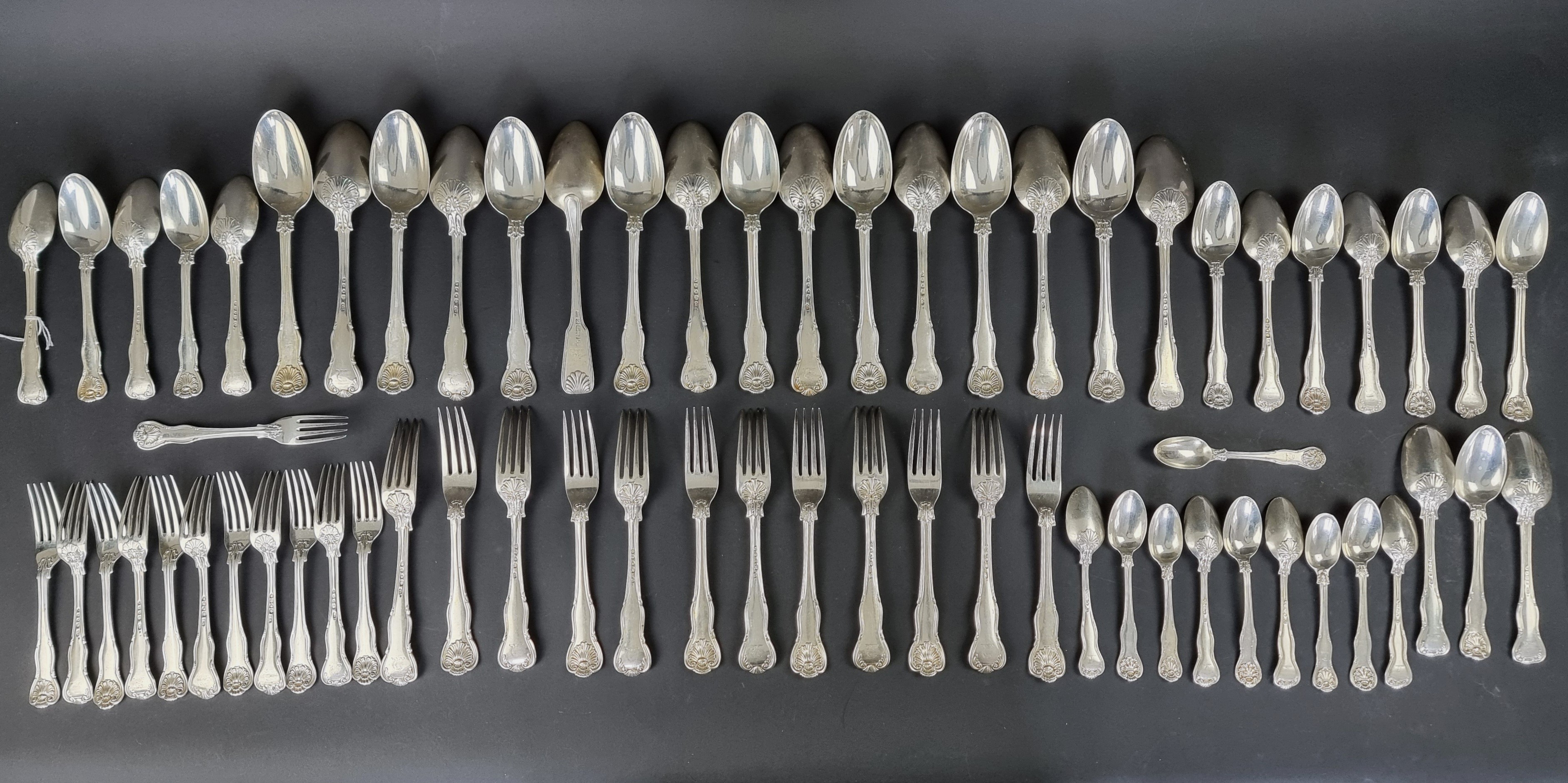 A part canteen of Victorian silver King's pattern cutlery, the majority by Chawner & Co. (George