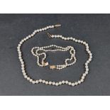 A pearl bracelet, having clasp stamped '375', 20cm; together with a pearl necklace, with clasp