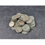 Coins: thirty five George V and George VI .500 silver 3d coins; together with twenty four George V