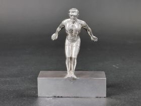 A silver swimming trophy, by James Fenton & Co, Birmingham 1954, 11.5cm high, 236g.