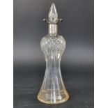 A silver mounted cut glass decanter and stopper, by William Hutton & Sons Ltd, Birmingham 1924, 34.
