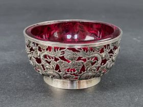 A Chinese pierced white metal bowl, by Wang Hing, Hong Kong, stamped '90', 9cm diameter.