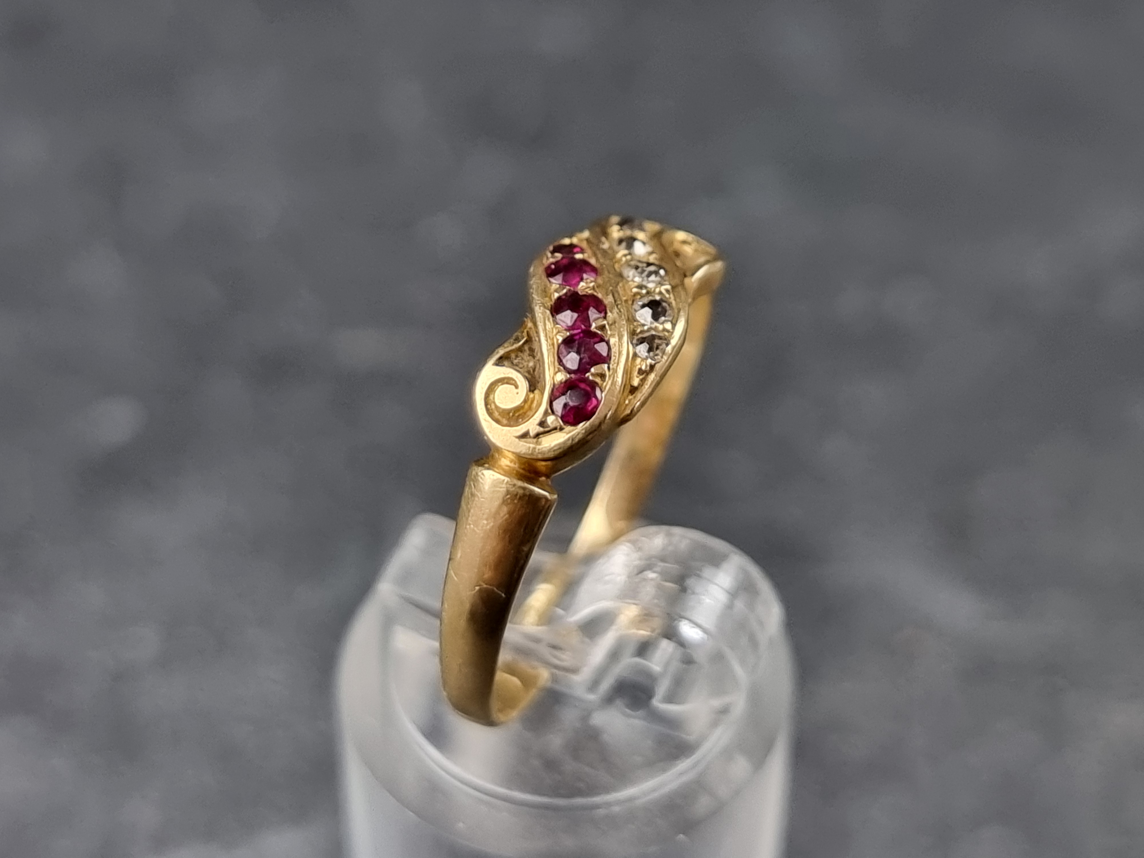 An 18ct gold ruby and diamond ring, set five diamonds and five rubies, size R, 2.6g. - Image 3 of 3