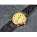 A circa 1940s Swiss 9ct gold manual wind wristwatch, 31mm, import mark Glasgow 1931, on Hirsch black