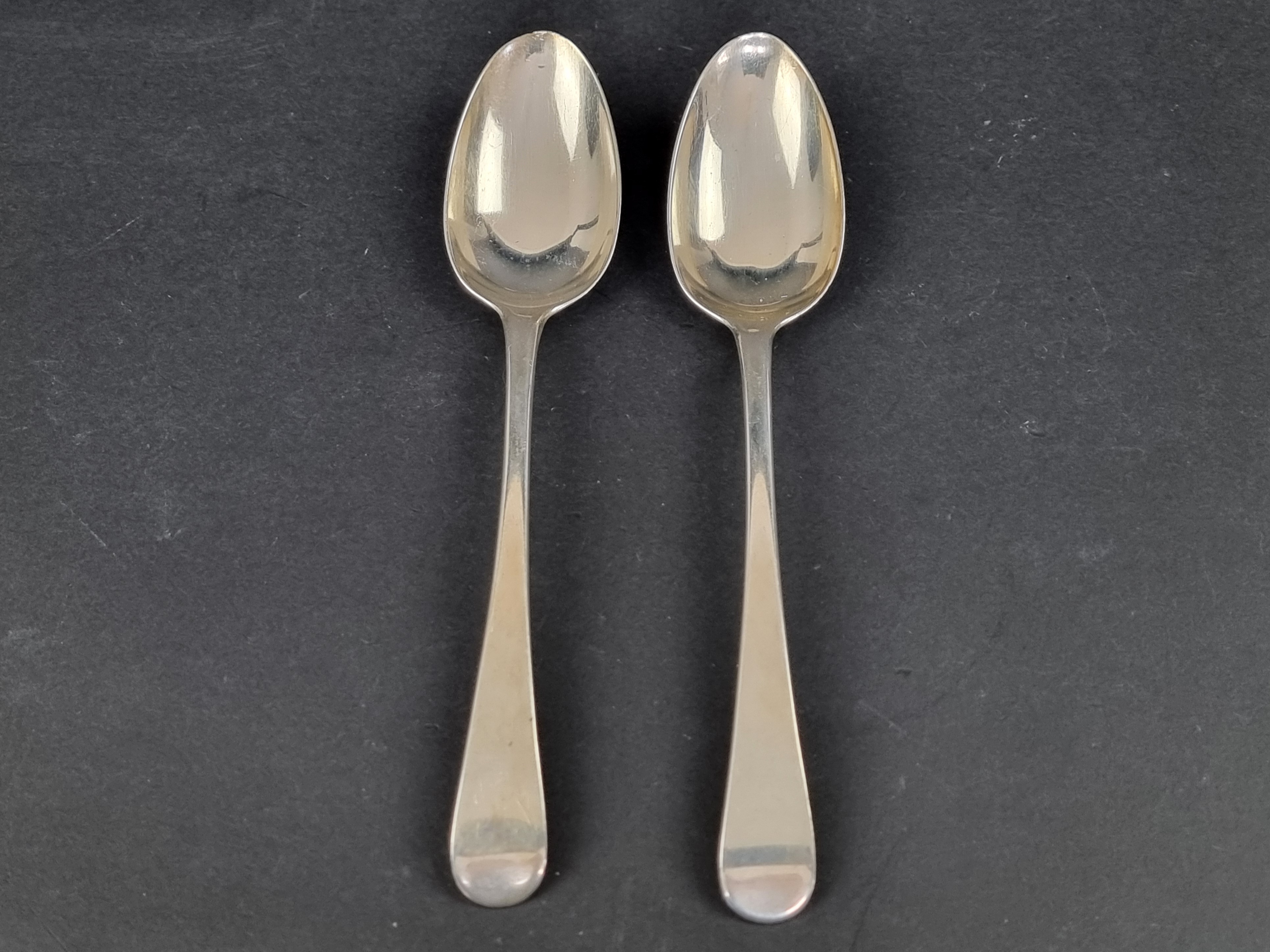 A pair of George III silver Old English pattern table spoons, by R C, London 1788, 143g.