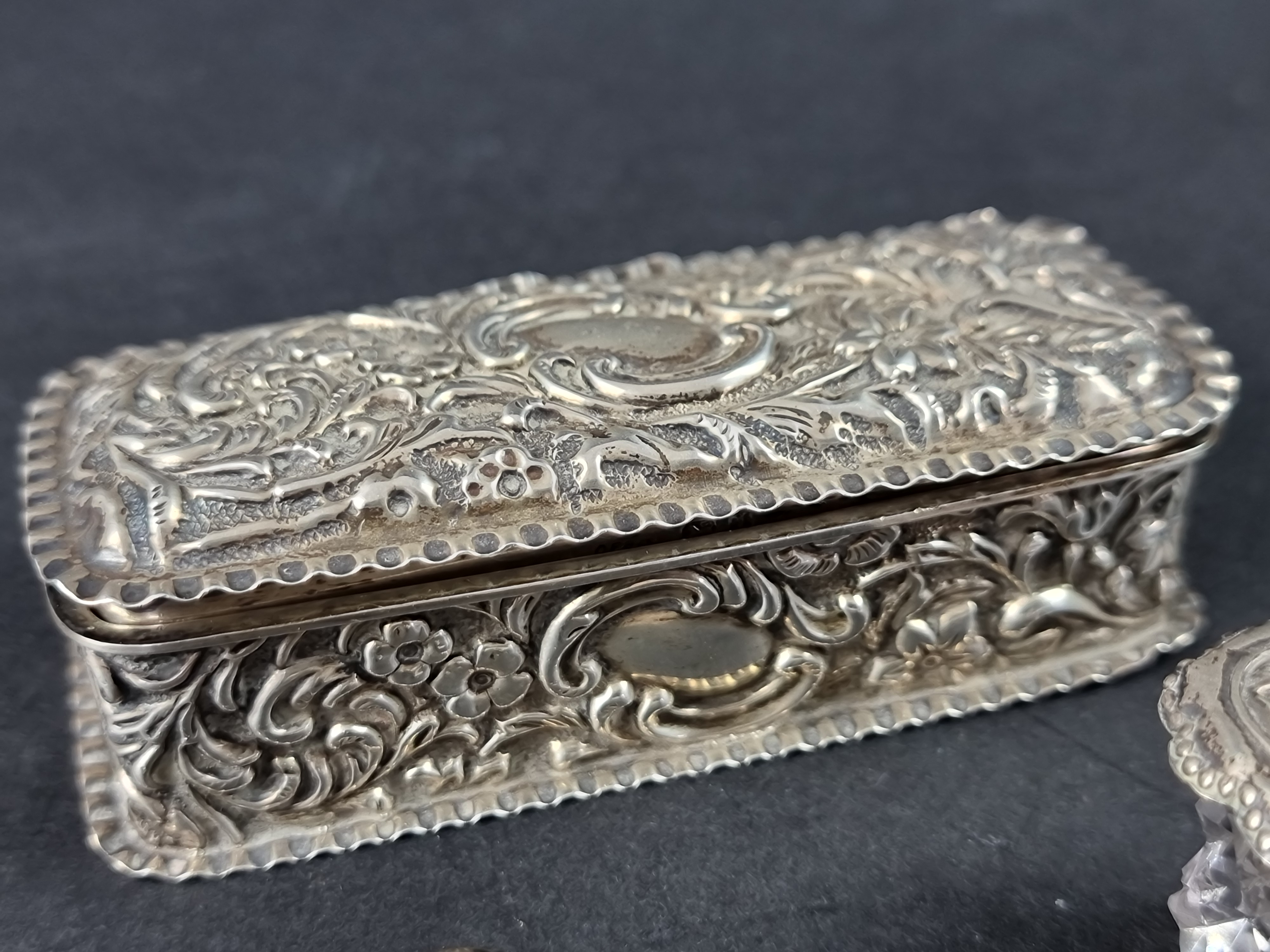 A Victorian silver box, probably by Charles Faraday & Samuel Davey, London 1894, 9cm wide;