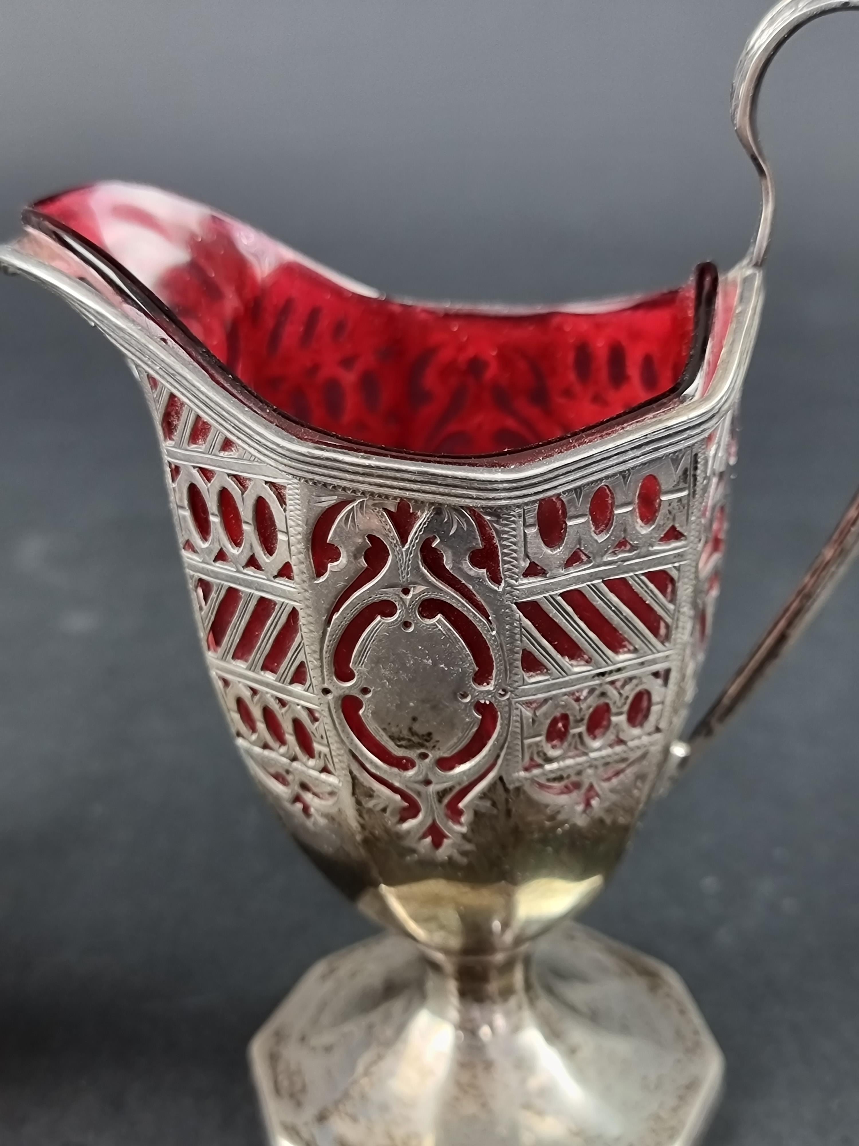 A George III silver jug, maker's mark rubbed, London 1794, height to handle 11cm; together with - Image 2 of 3