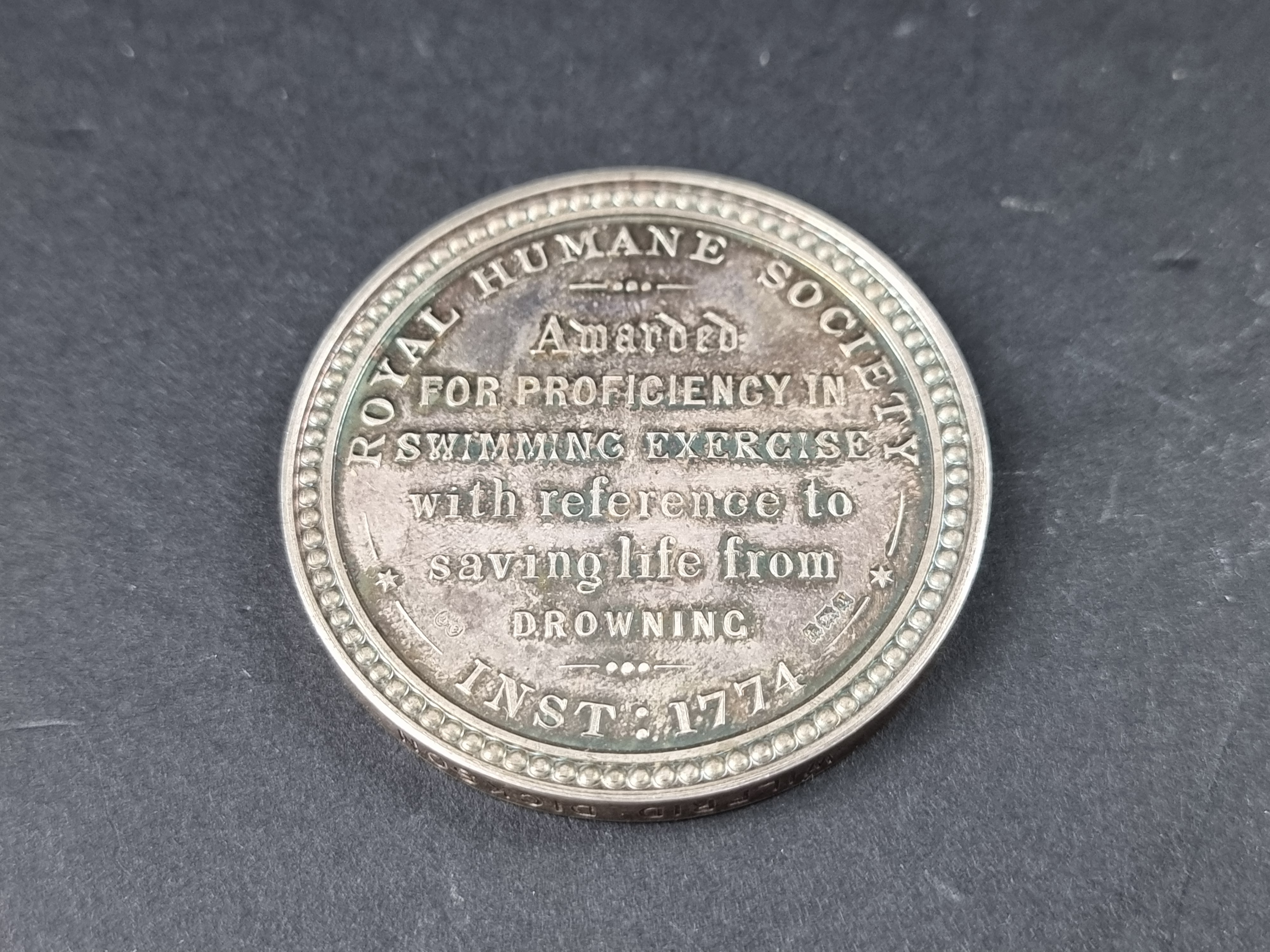 Medals: a cased Royal Humane Society silver medal, by Elkington & Co Birmingham 1933, engraved 'H. - Image 2 of 2