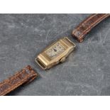 A circa 1930s 9ct gold manual wind ladies wristwatch, 14mm, with brown leather strap.