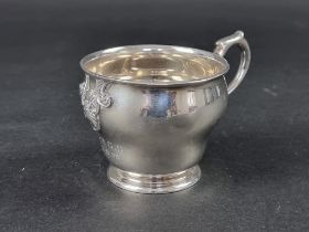 An unmarked Continental metal cup, height to handle 7.5cm.