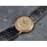 A 1950s Tudor 'Prince' 9ct gold automatic wristwatch, 35mm, on later black leather strap.