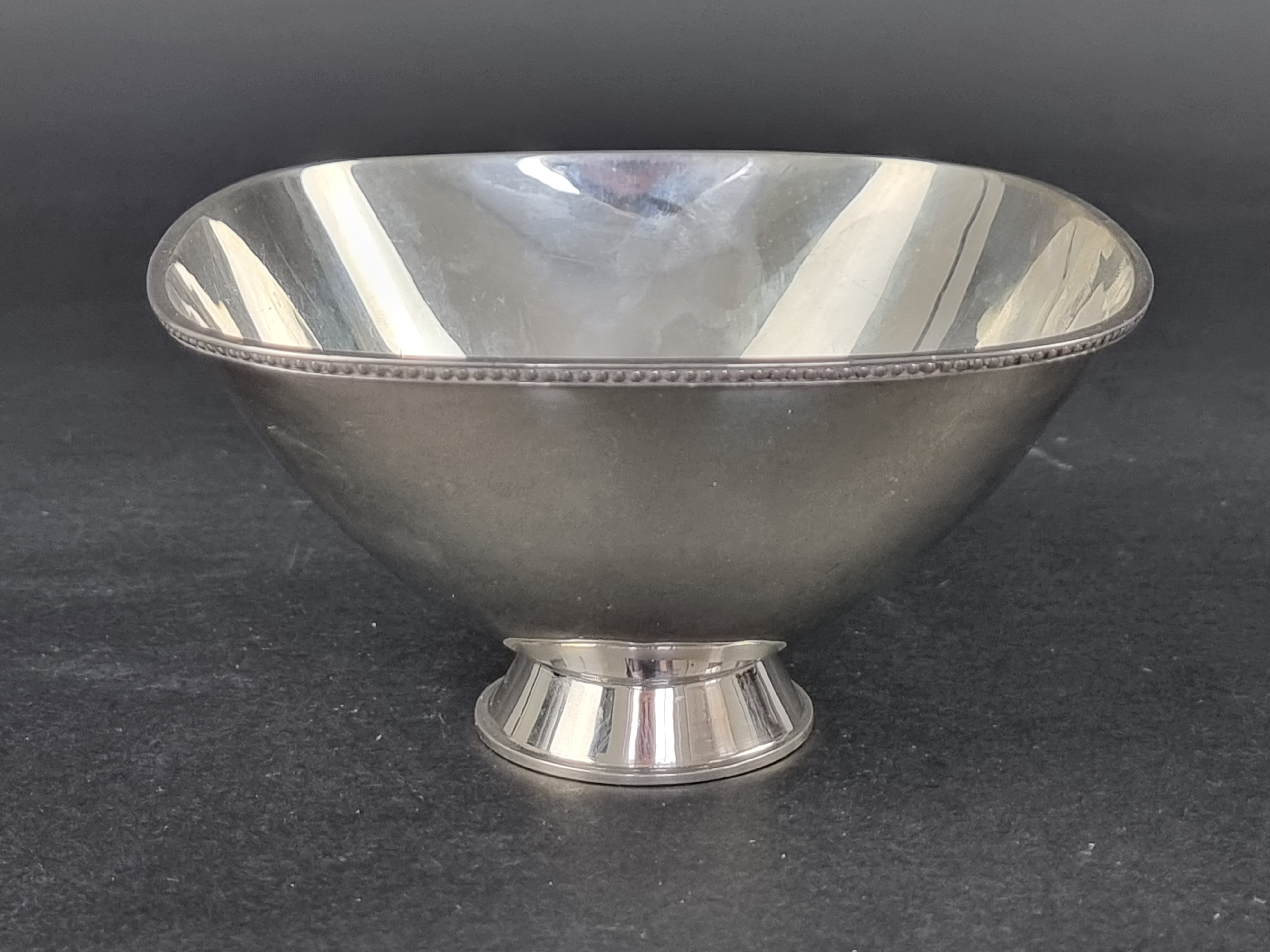 A white metal bowl, by Helene Gardfeldt for CF Carlman, Stockholm 1962, 8cm high.